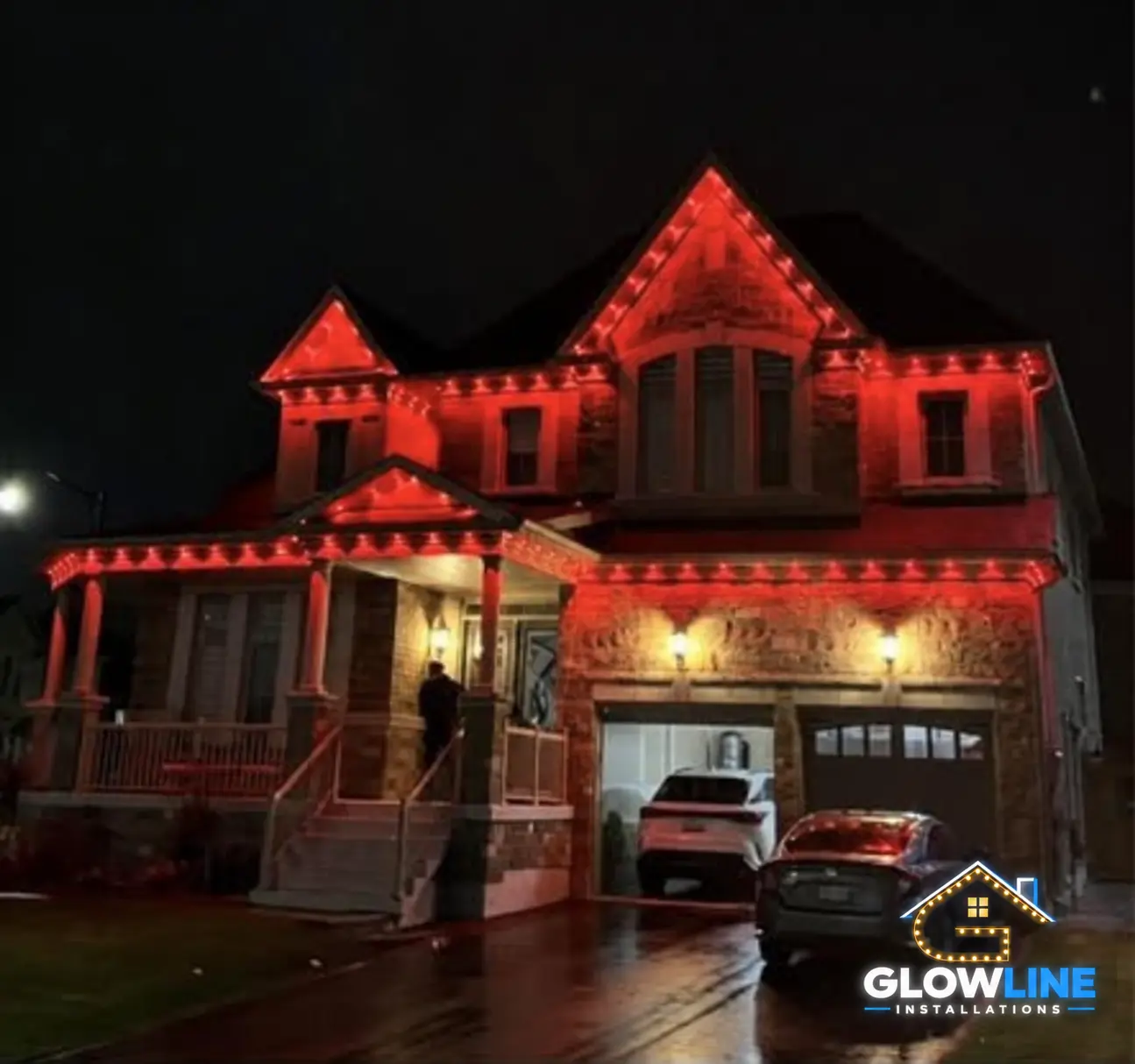 Red permanent outdoor lights installed on a GTA home
